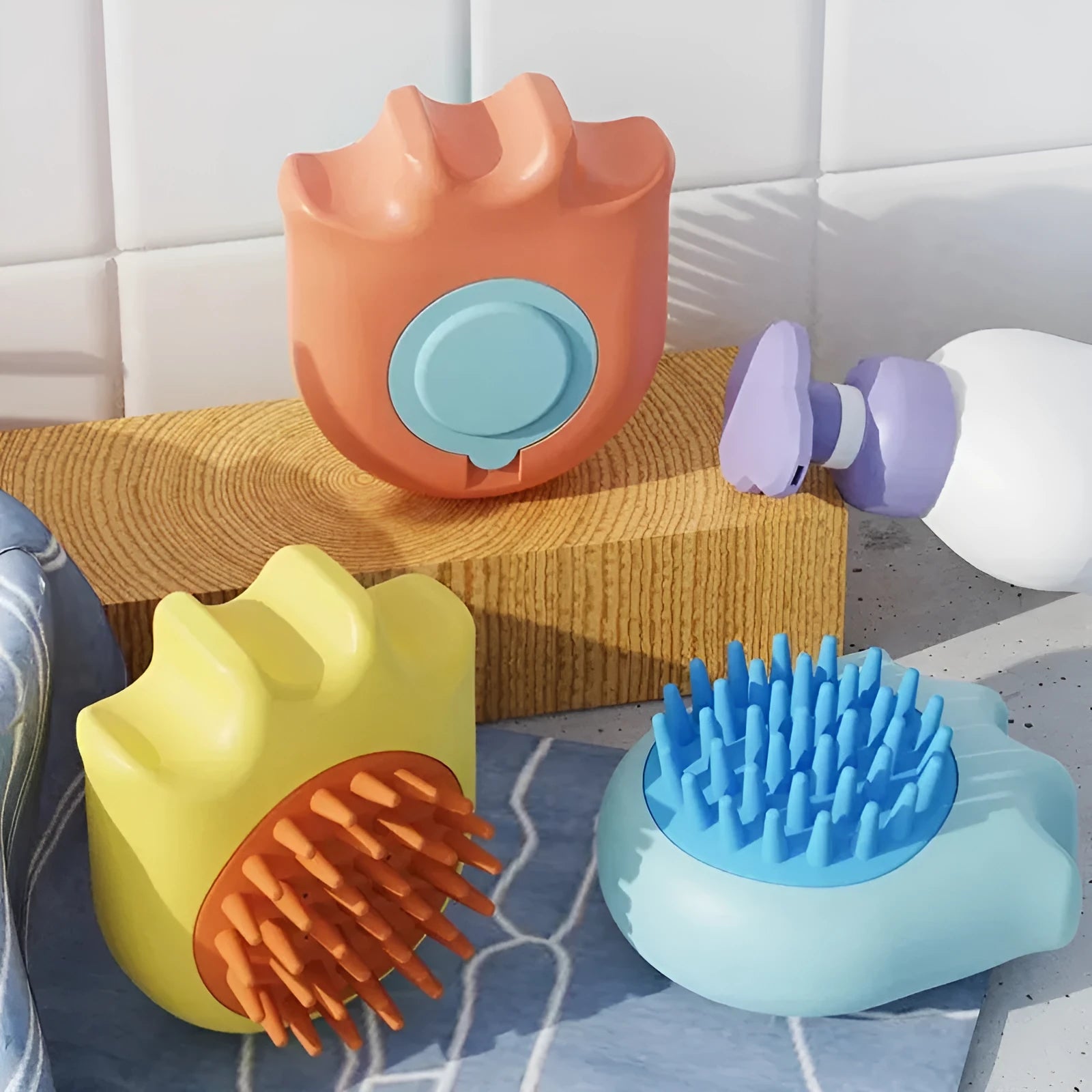 Blue plastic pet bath brush with built-in shampoo box and comb head