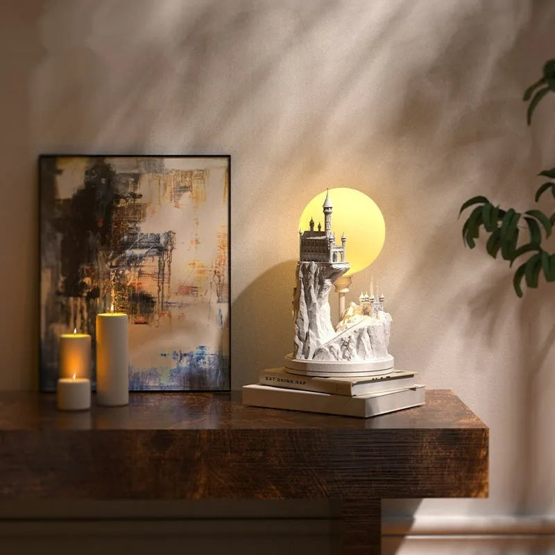 White composite gypsum table lamp with wire switch on cord.