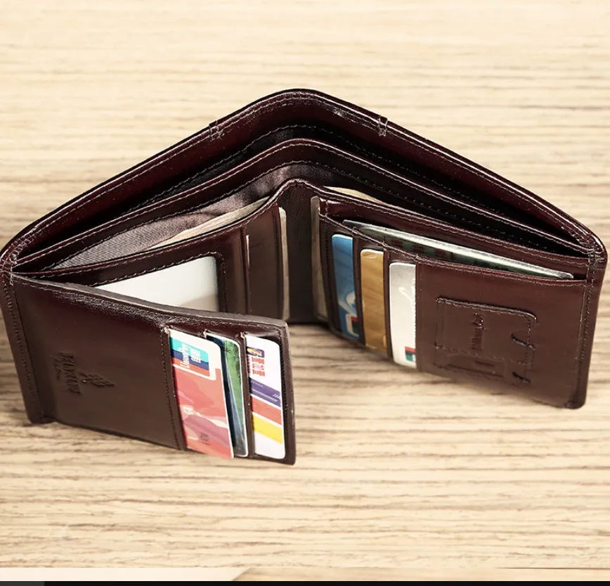 Men's leather wallet showing multiple compartments including card slots and change pocket