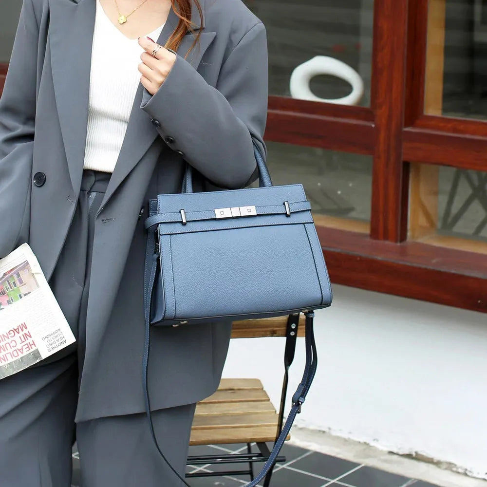 Genuine leather small square shoulder bag in almond green with internal organisation compartments