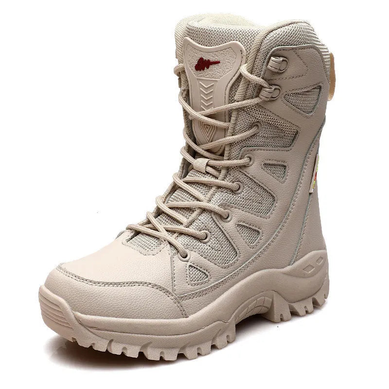 Men's beige cowhide hi-top hiking shoes on a rocky outdoor trail.
