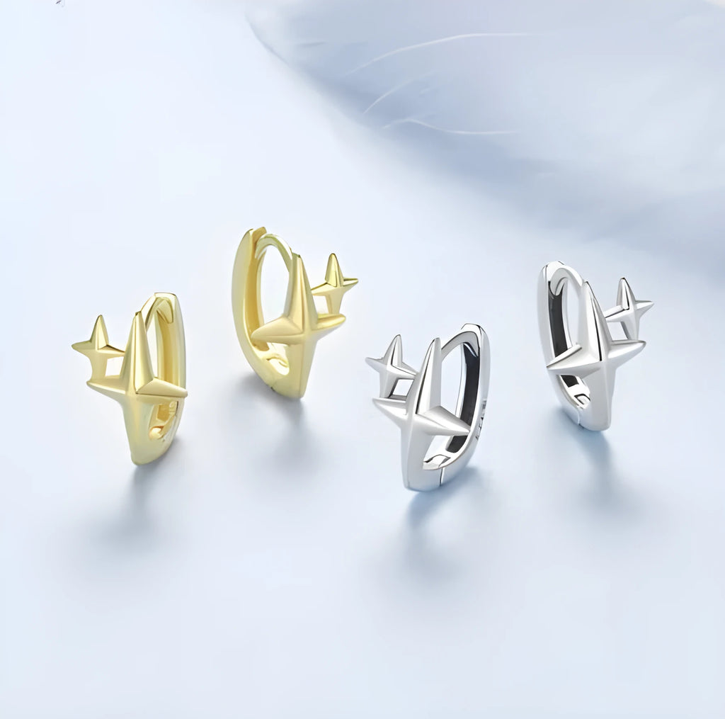 Sterling silver star clip earrings with oxidised finish and XINGX decorative elements