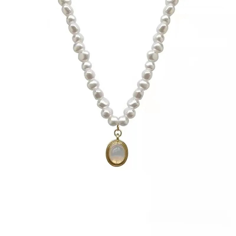 French Court vintage style pearl necklace with geometric pendant on an adjustable alloy chain.