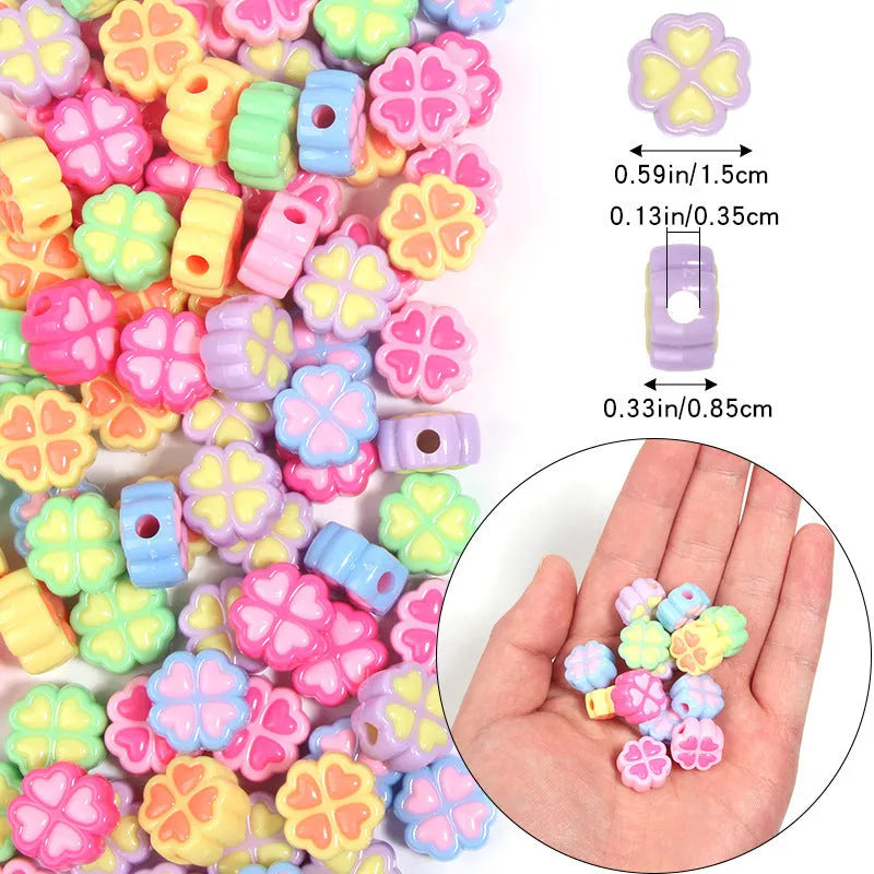 Assortment of 15mm frosted acrylic four-leaf clover beads in pink, yellow, green, blue, purple, and rose red.