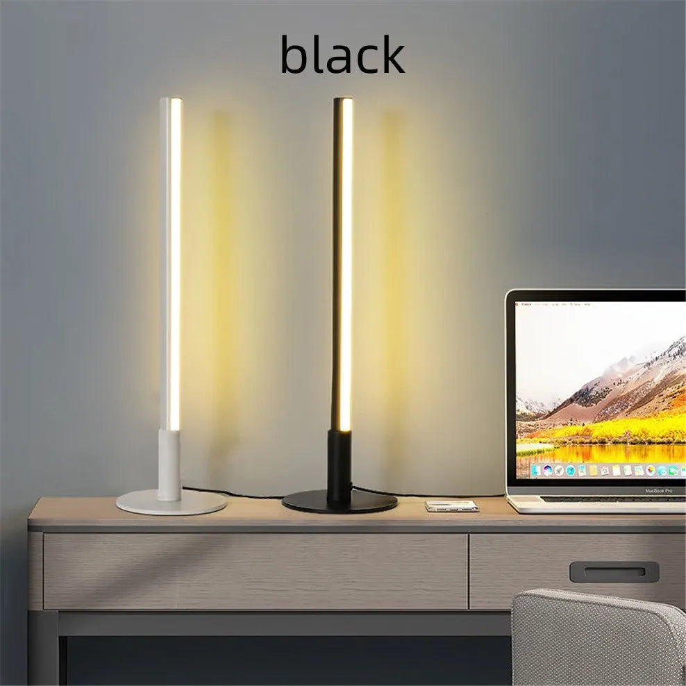 Black retro decorative atmosphere lamp with aluminium alloy body on a side table.