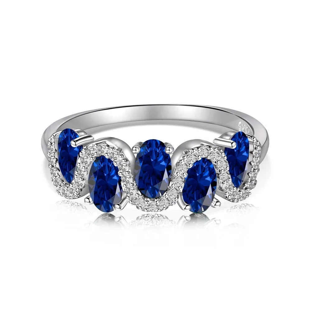 S925 sterling silver oval twisted ring with zircon inlay on white background, women geometric silver ring