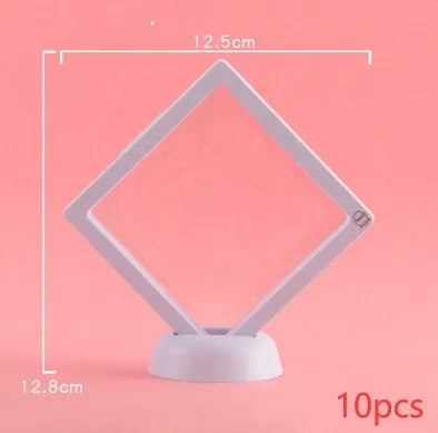 Transparent 3D floating display case holding a coin, with black and white size options