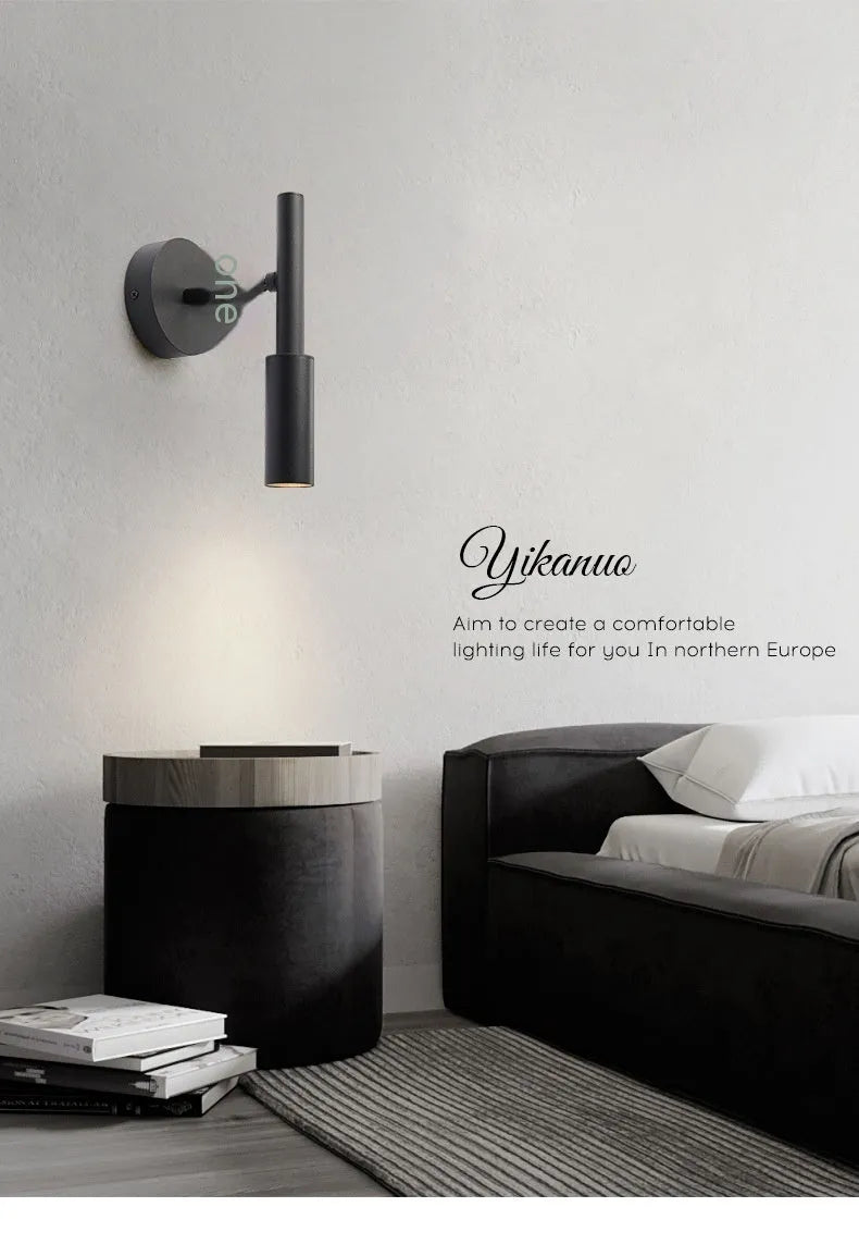 Modern wrought iron wall lamp in black or white with three light colour options