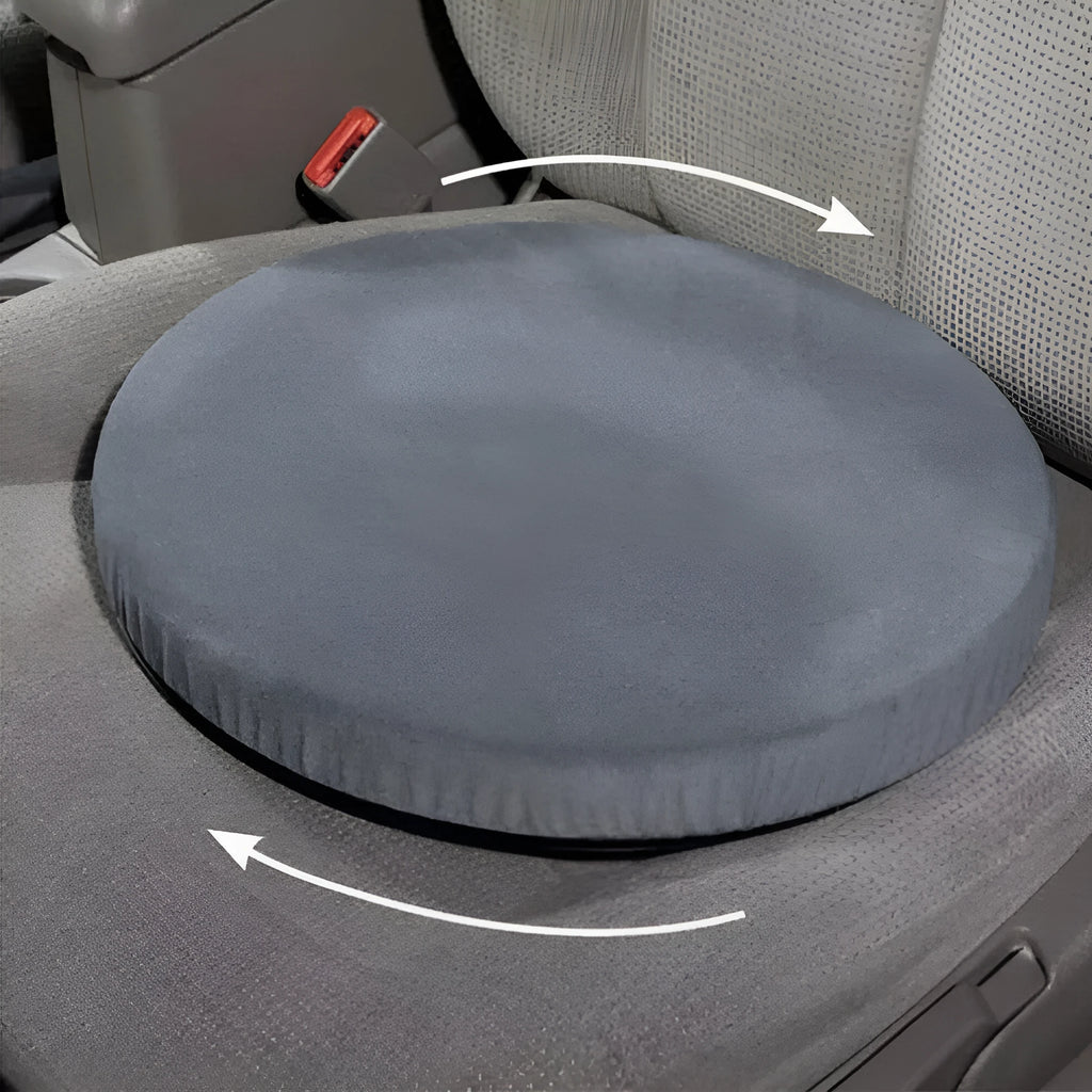 Grey car seat cushion with 360-degree rotation feature and non-slip base on a car seat.