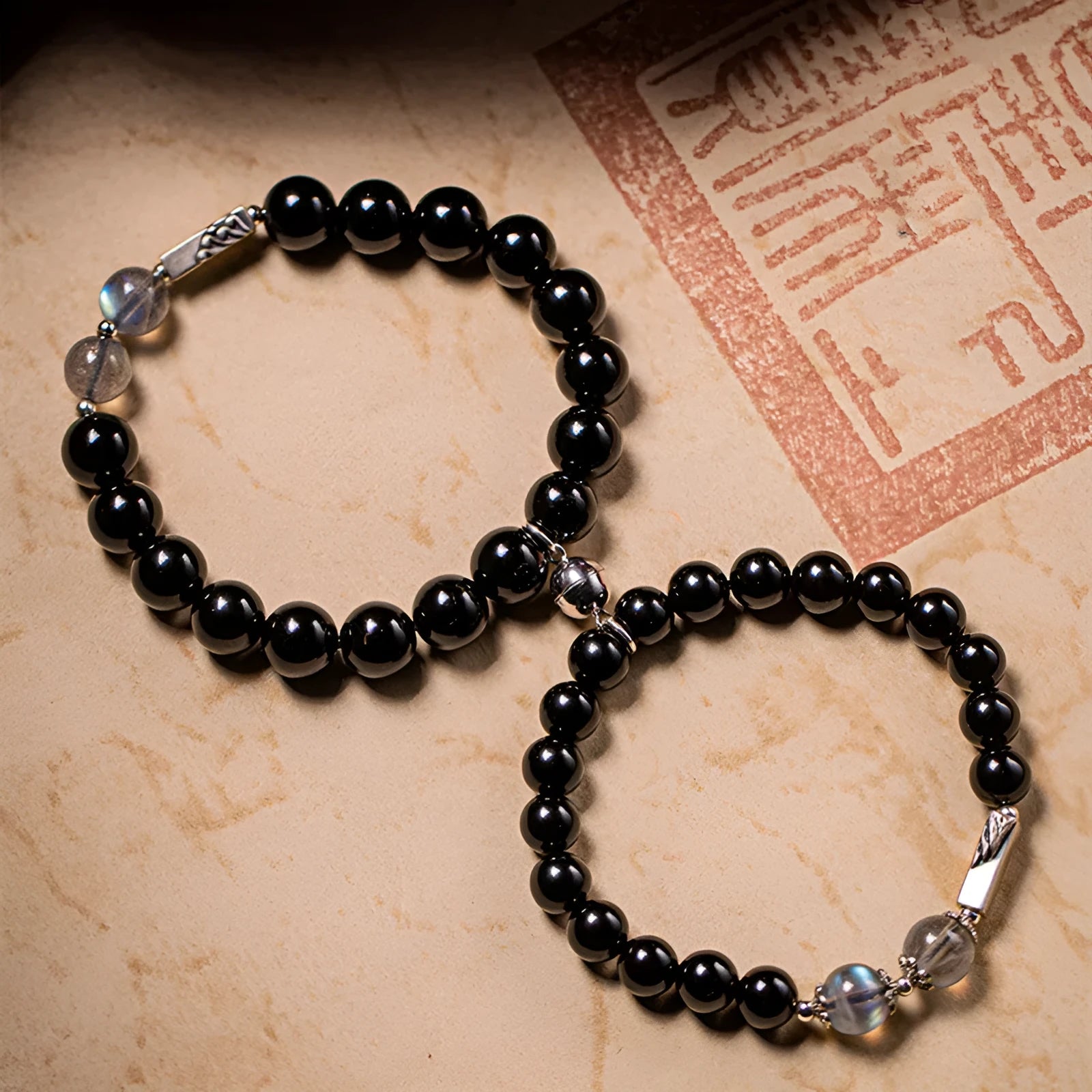 Black obsidian Buddha beads couple bracelets with 8mm and 10mm beads on adjustable cords