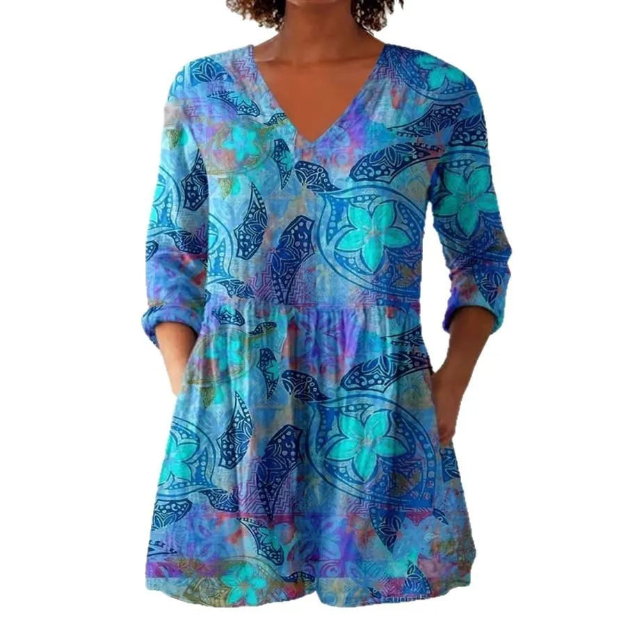 Women's retro-style slim fit long-sleeved top with a printed pattern, shown in one of twelve available colours.