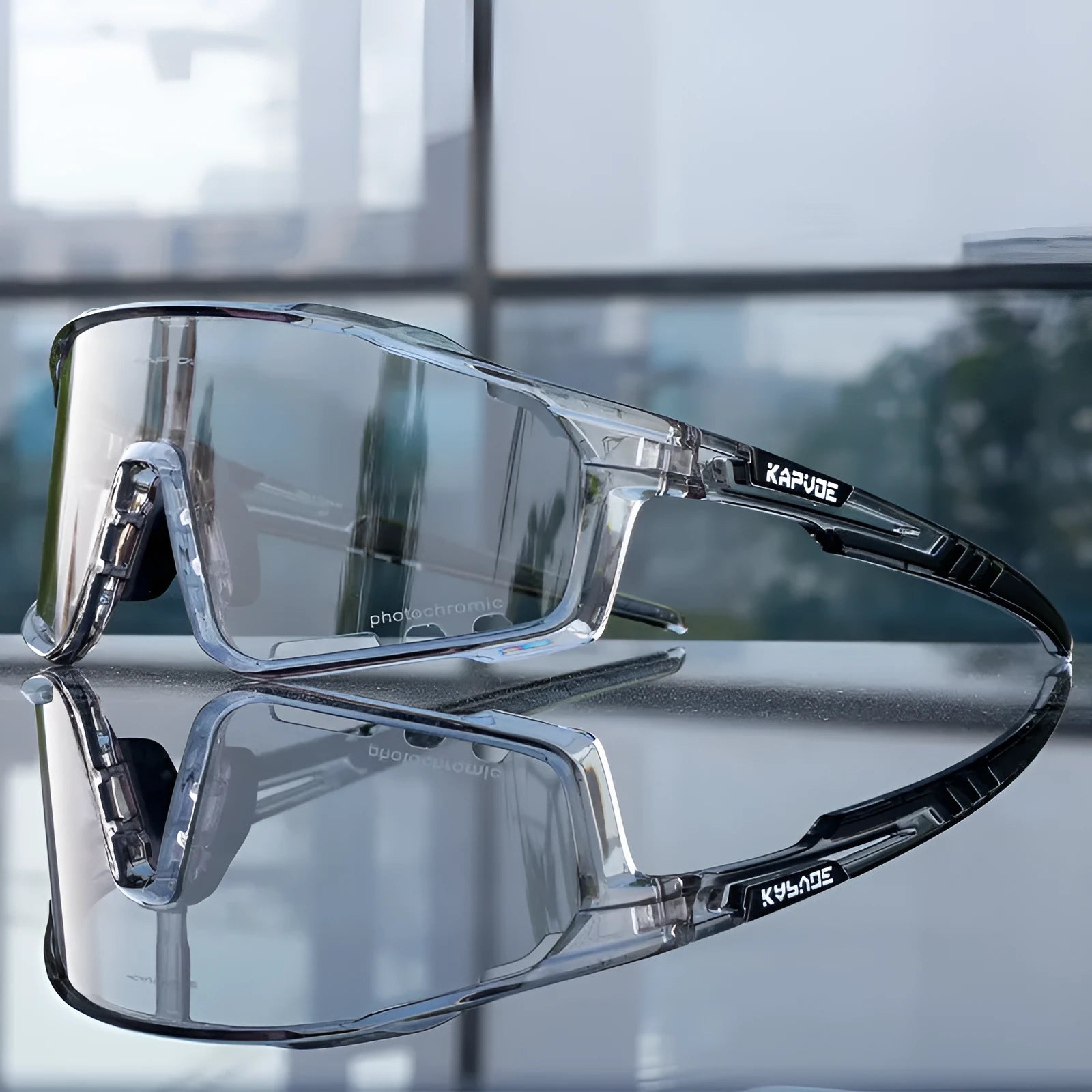 Photochromic sports goggles with a semi-rimless TR90 frame for cycling and outdoor use.