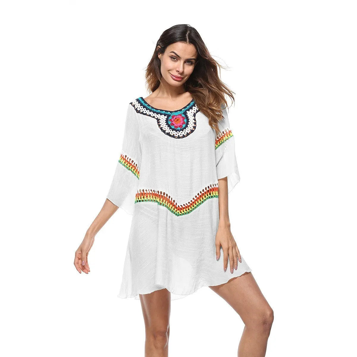 Crocheted ethnic style sun protection beach clothing for women in white, black, sapphire blue, or apricot.