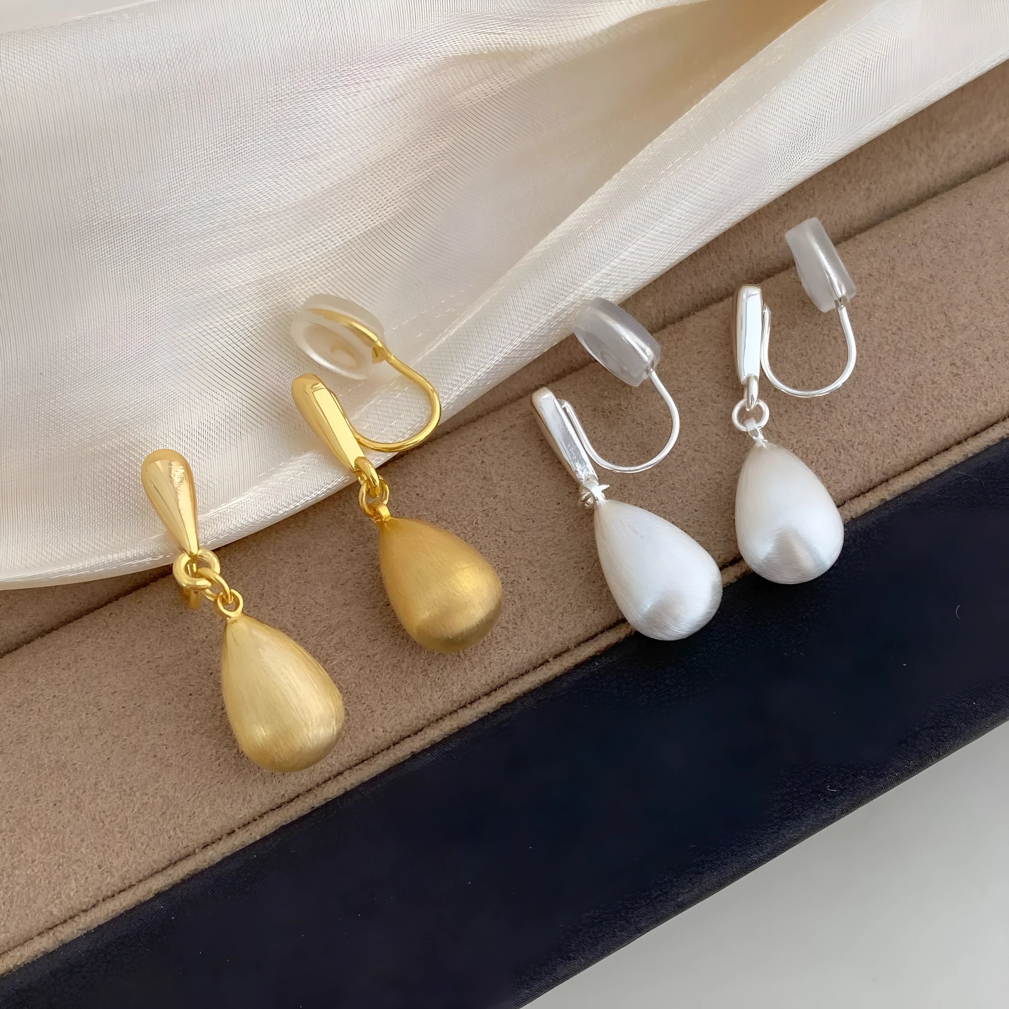 Copper teardrop drop pendant earrings in gold electroplated finish, pair of ear clips