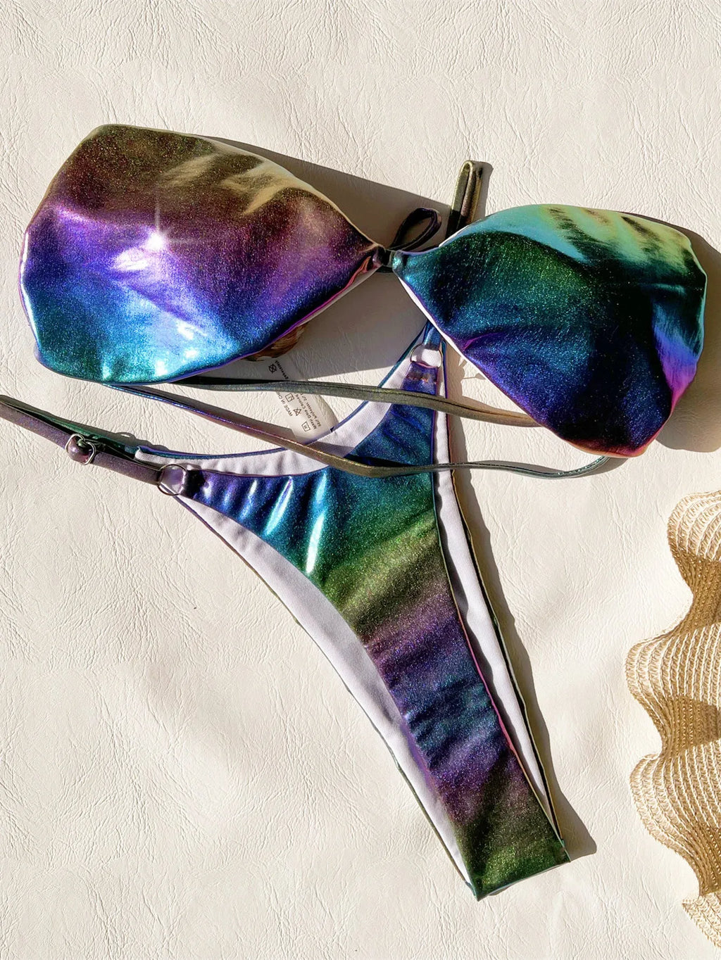 Women's gradient purple bikini swimsuit set on a mannequin