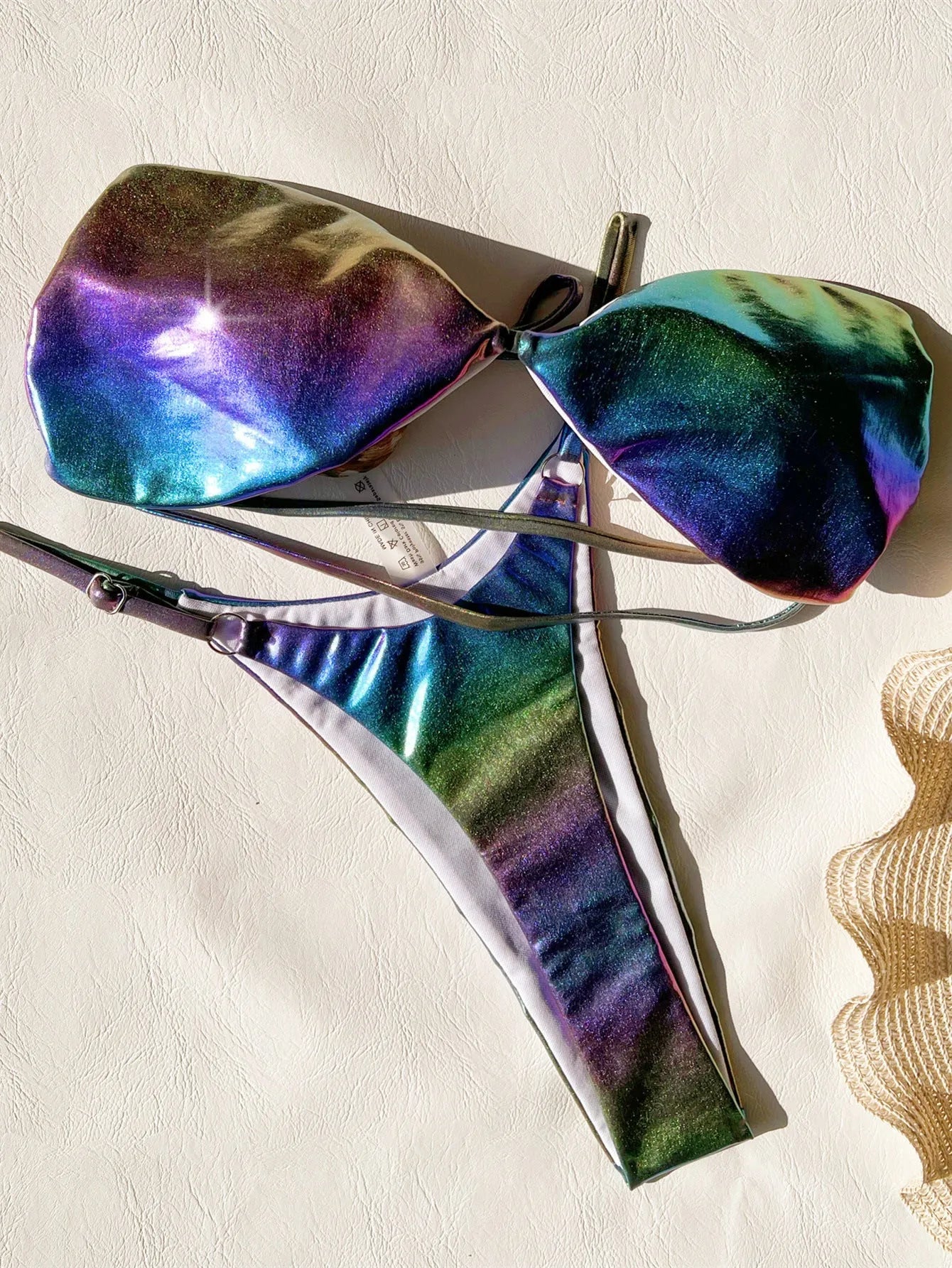 Women's gradient purple bikini swimsuit set on a mannequin