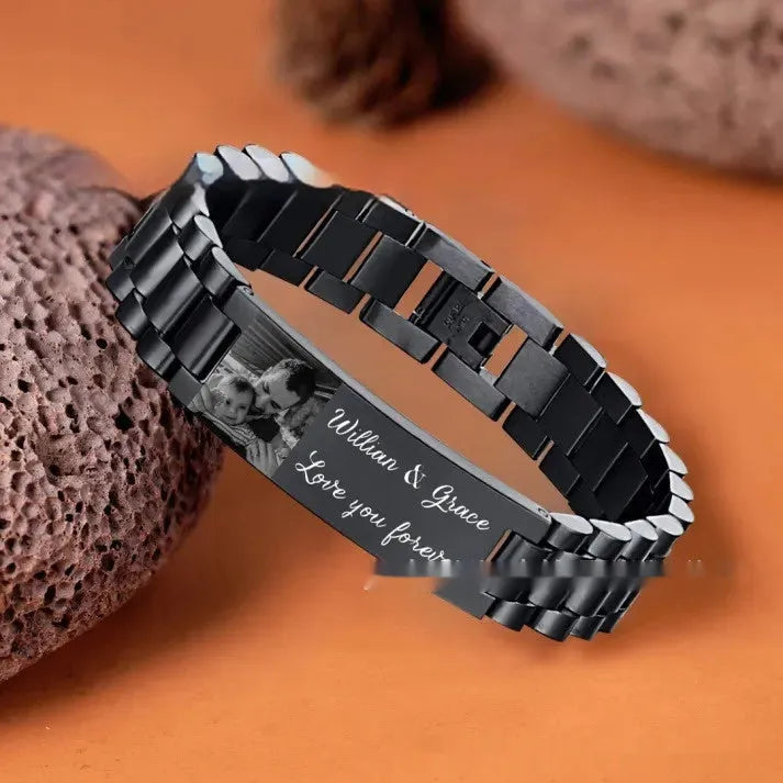 Men's curved stainless steel lettering bracelet with engraved text and titanium construction