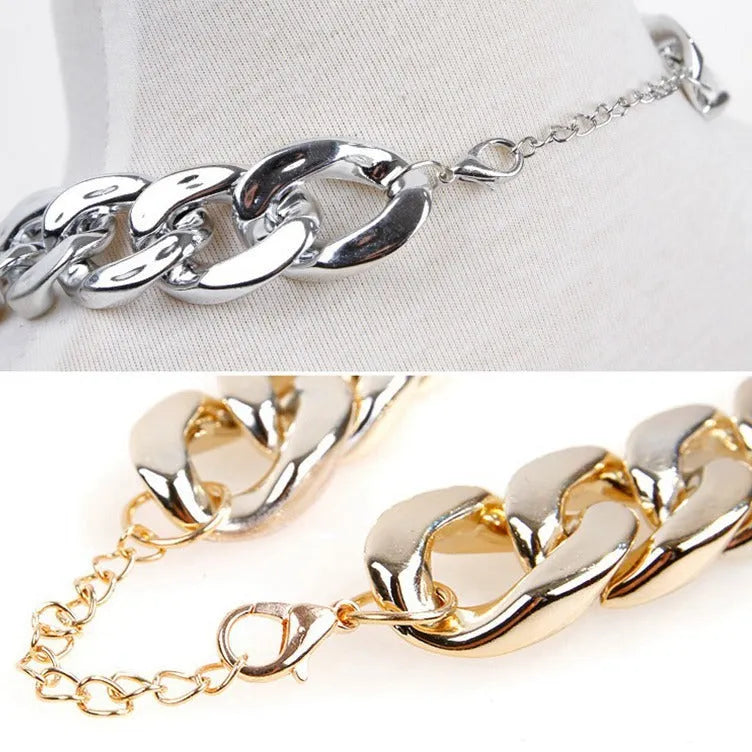 Geometric dog collar ornament with twisted chain buckle in gold, rose gold, and white colours.