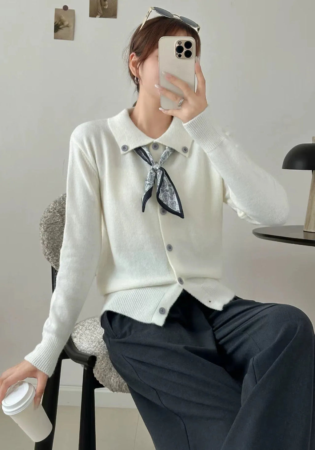 Women's beige cardigan sweater with a built-in lapel scarf collar and long sleeves.