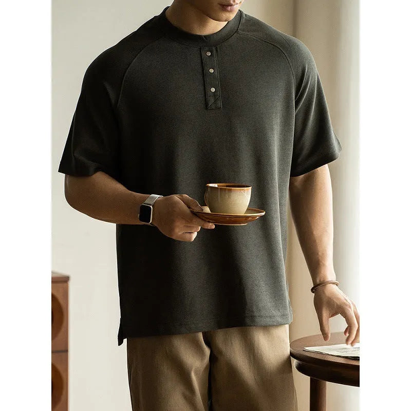 Men's smoky gray casual pullover top with raglan sleeves and a textured fabric.