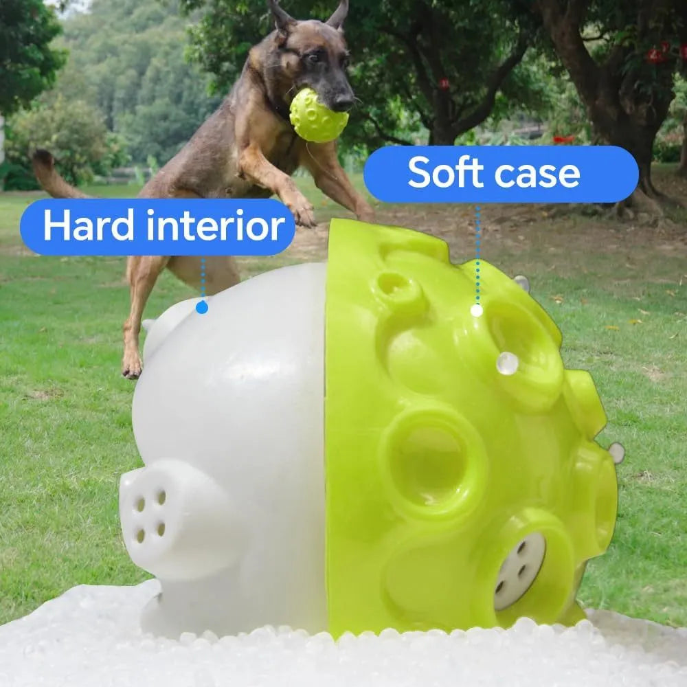Durable natural rubber dog chew toy ball in assorted colours with a textured surface.