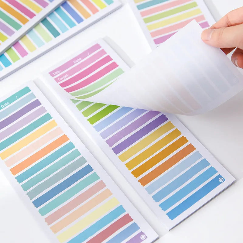 Super long cartoon sticky note pad in plastic storage box showing multiple colour options