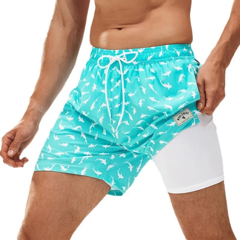Men's loose fit quick-drying swim trunks in a floral or tropical print colour on a spandex fabric.