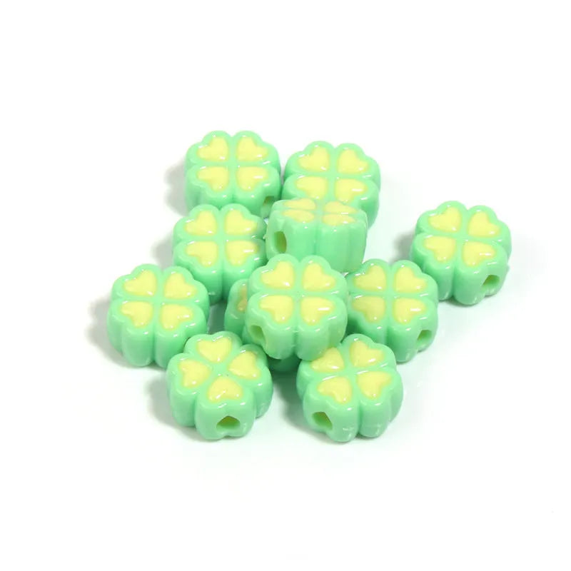 Assortment of 15mm frosted acrylic four-leaf clover beads in pink, yellow, green, blue, purple, and rose red.