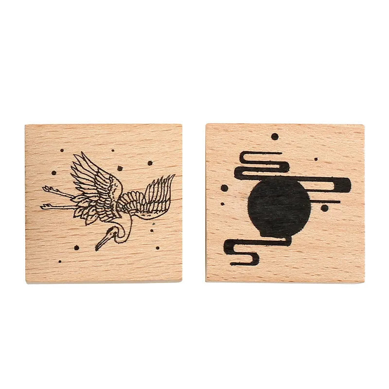 Mr. Paper wooden stamp set with four crane designs on a white background