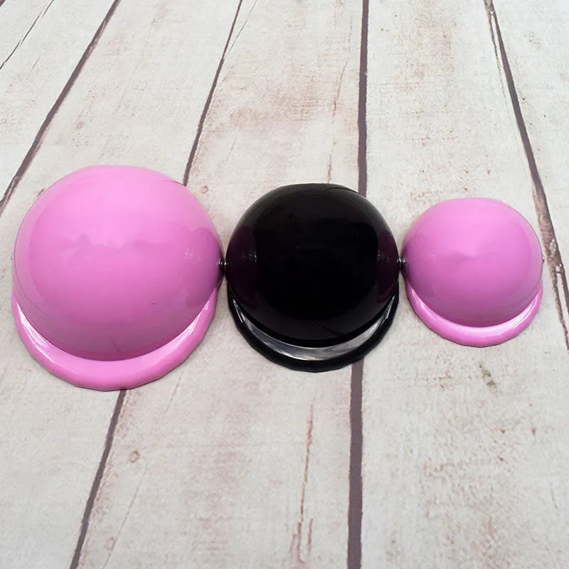 Solid colour plastic motorcycle cap helmet for dogs in pink, shown in small size.