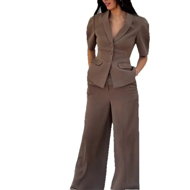 Brown men's slim fit two-piece polyester suit with long sleeves and regular trousers on a hanger.