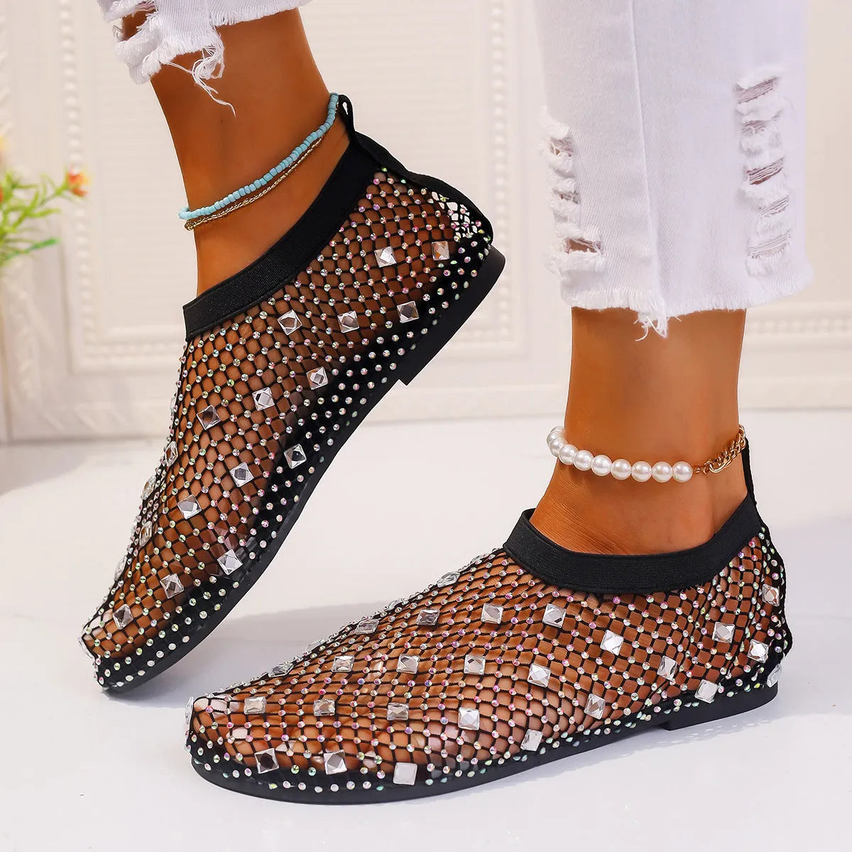 Women's flat mesh sandals with colourful rhinestone decoration on heel strap