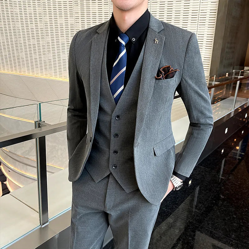 Men's slim fit business suit in black cotton blend fabric with structured tailoring