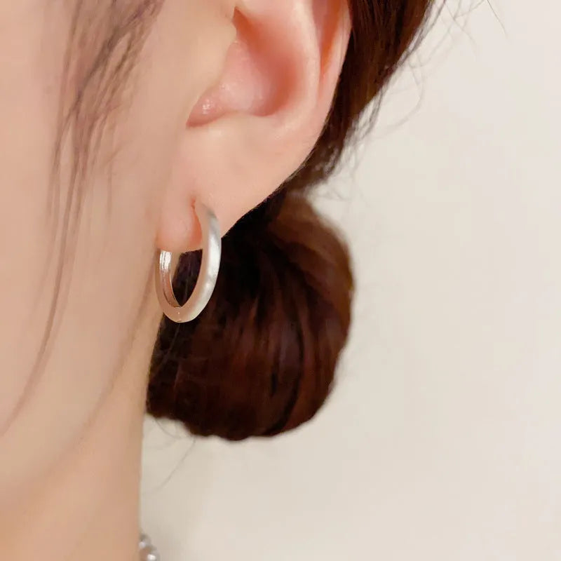 Geometric circle ear clips for women in gold or silver colour with real gold plating