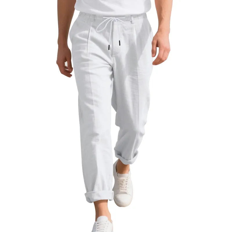 Men's linen casual trousers in light khaki colour with loose straight-leg fit and drawstring waist