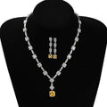 Copper inlaid zircon citrine necklace earring set with 18-inch claw chain on white background