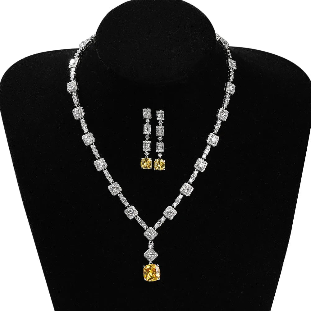 Copper inlaid zircon citrine necklace earring set with 18-inch claw chain on white background
