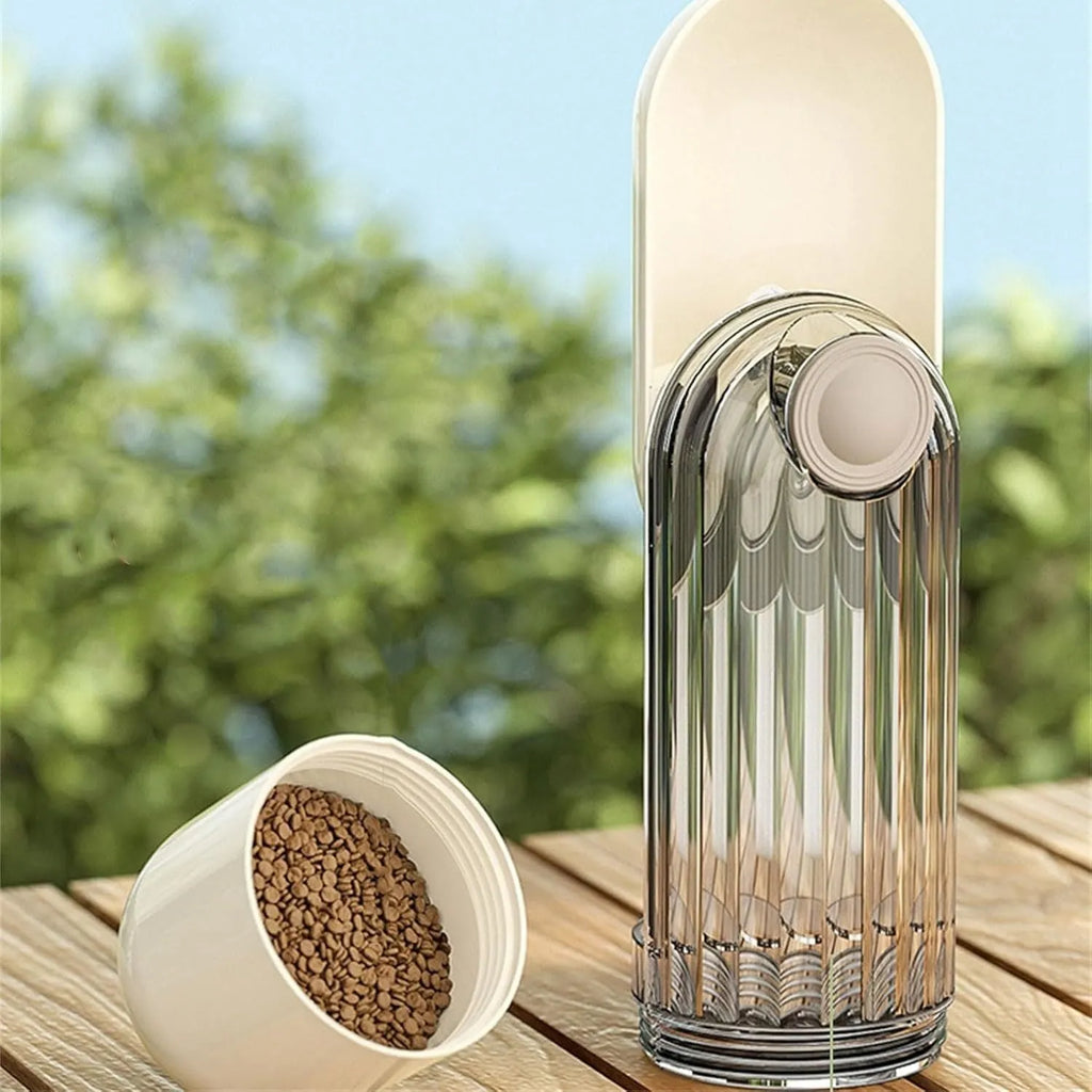 Beige foldable dog water bottle with food dispenser showing collapsible design and drinking tray
