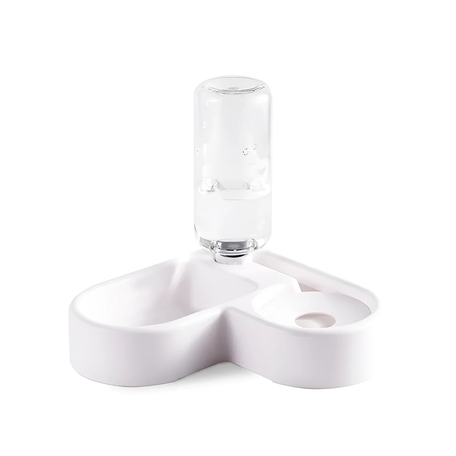 White pet water fountain for cats and dogs indoors on a kitchen floor.
