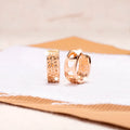 Rose gold hollowed-out heart-shaped women's earrings with circular silhouette