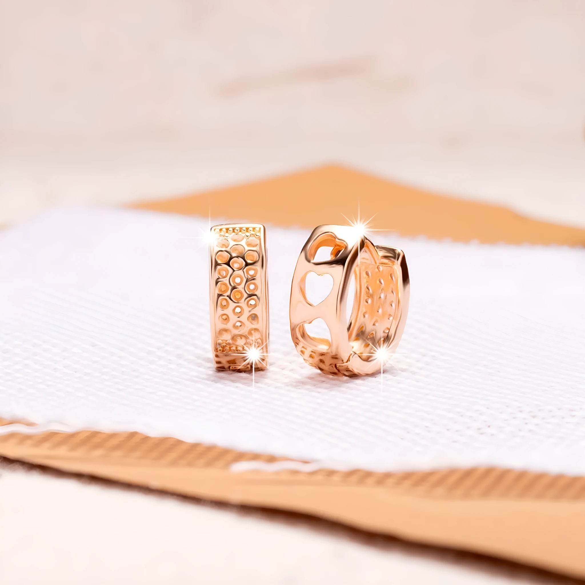 Rose gold hollowed-out heart-shaped women's earrings with circular silhouette
