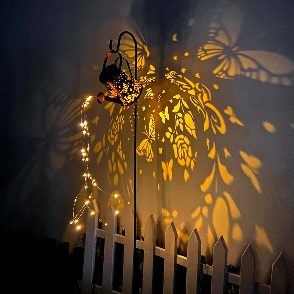 Tapered butterfly pattern solar garden lamp with iron construction and warm white finish