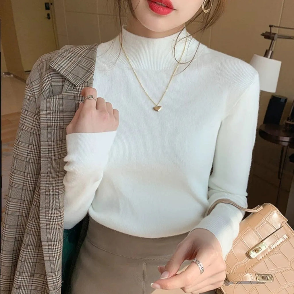 Slim fit viscose fibre knitted shirt with long sleeves in apricot colour showing front view