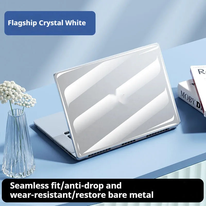 Clear plastic protective case for MacBook Air and MacBook Pro laptops on a table.