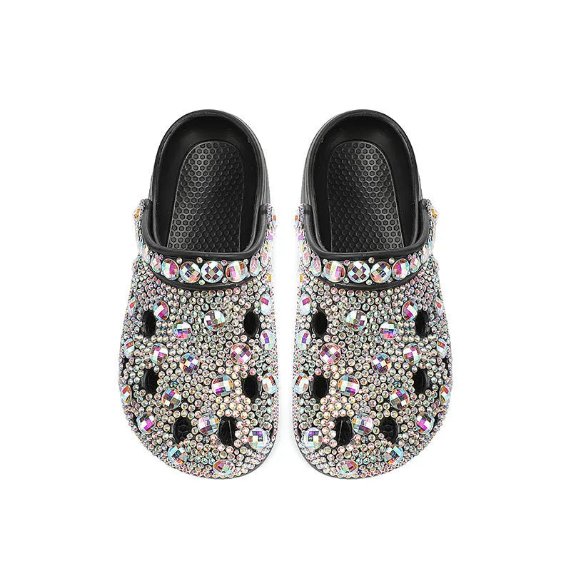 Black women's platform casual sandals with rhinestone detail on an EVA upper and sole.