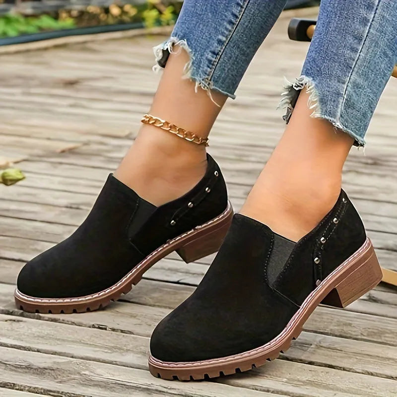 Plus size women's suede ankle boots with low heel, round toe, and elastic band in black