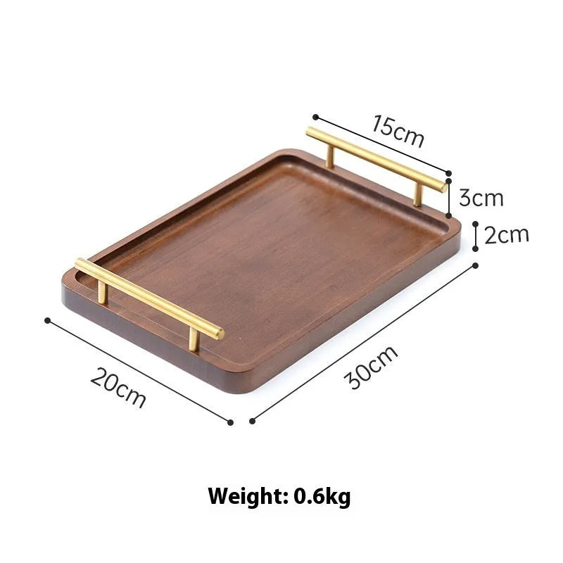 Brown handled bamboo square serving tray on a table