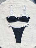 Black low waist women's bikini swimsuit with stitching split detail on the pants.