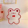 Square clear acrylic storage box with cute character print, showing six design options for desk organisation