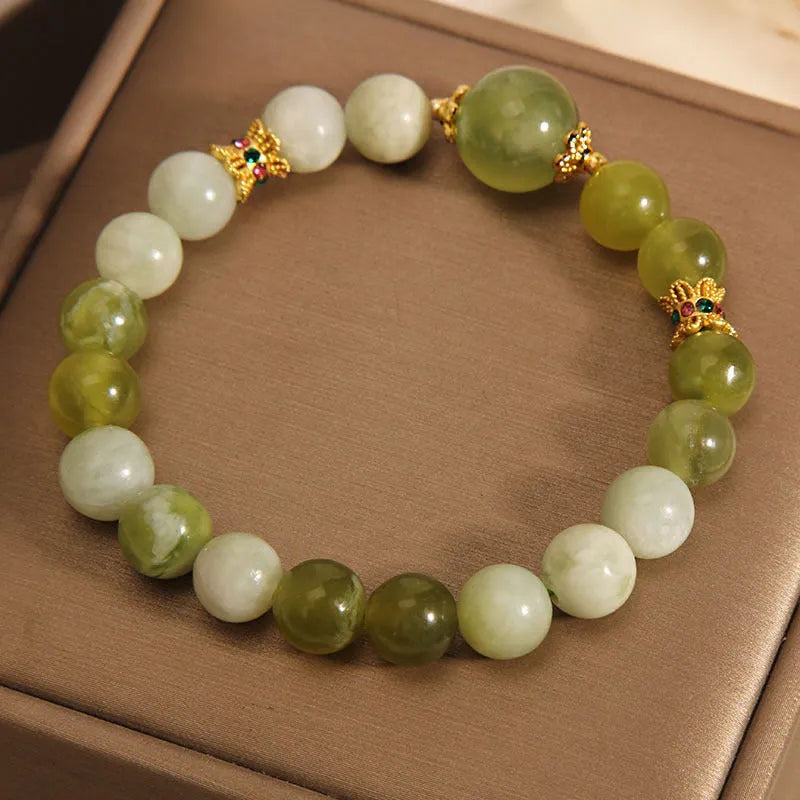 Women's jade bracelet in Xiuyan green colour with original Mori style design
